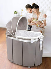 Load image into Gallery viewer, Oval Rocking Baby Bassinet with Bedding, Storage, and Pad - EK CHIC HOME
